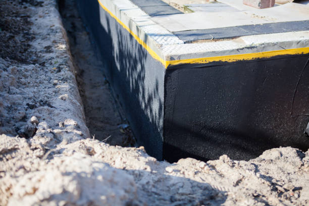 Professional Waterproofing technician working in Poolesville, MD